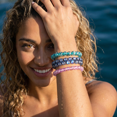 NOGU Made to Pair with Grey Double Mermaid Glass bracelets styled in layered turquoise, grey-blue and pink glass beads.