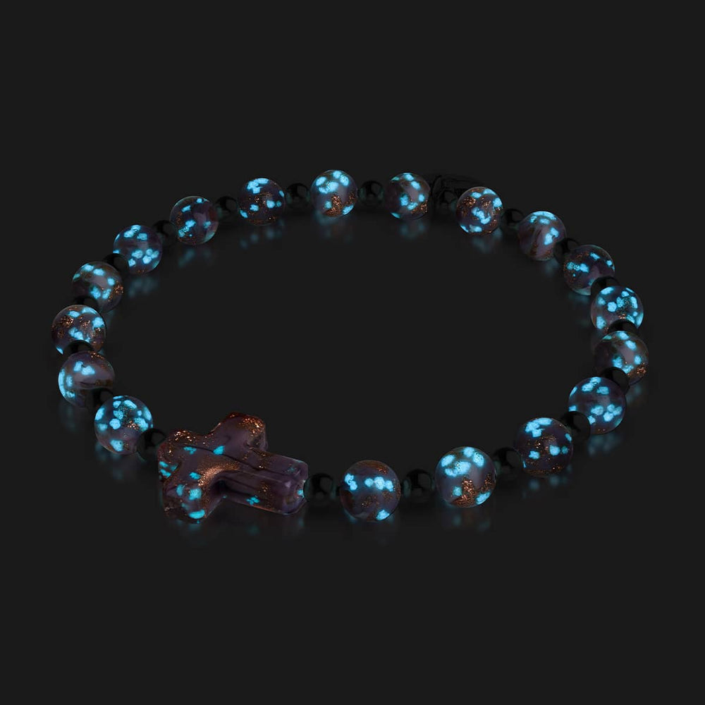 Periwinkle Firefly Glass Cross Bracelet with glowing blue phosphorescent beads and silver finish by NOGU
