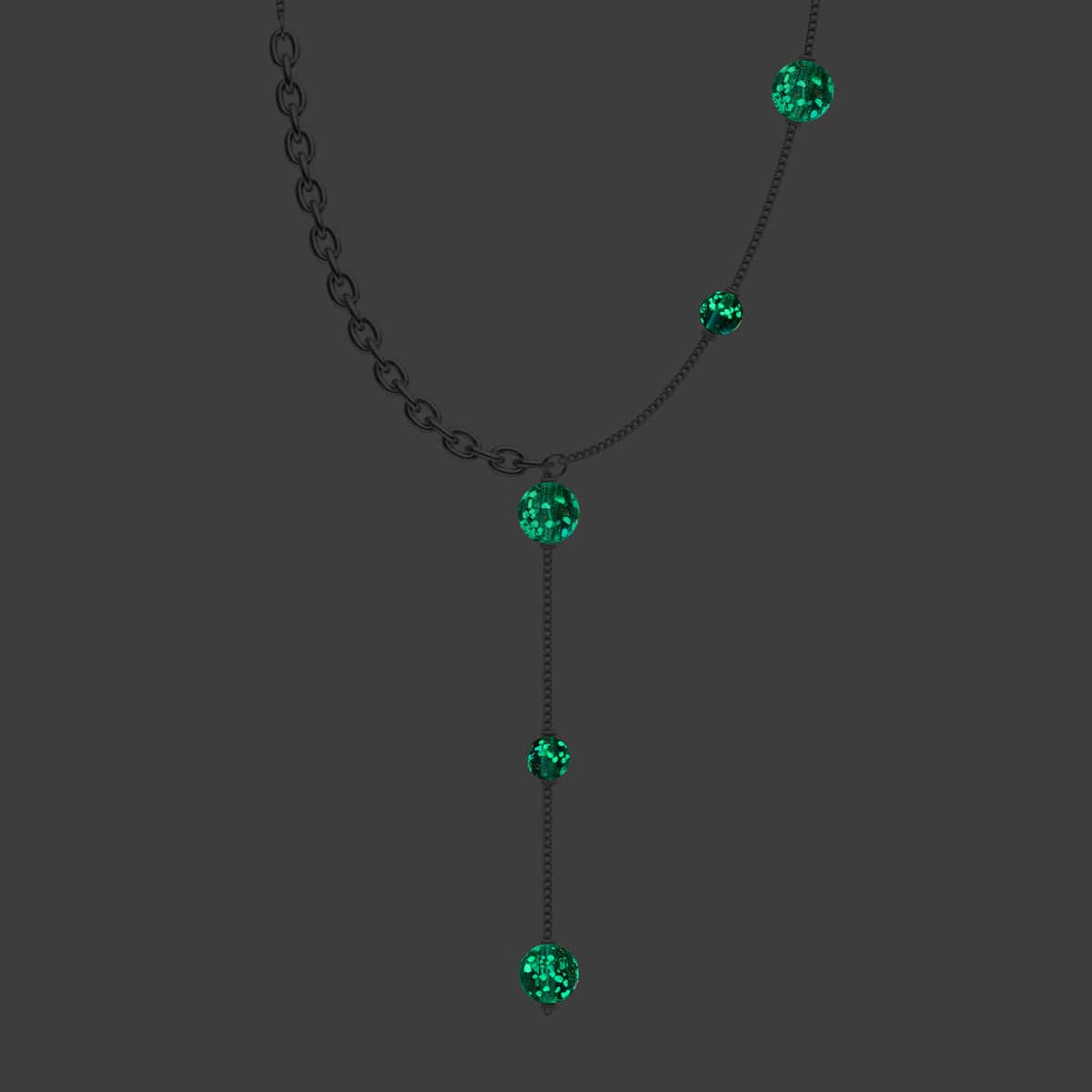 A close-up of the Teal Firefly Glass pendant necklace, showing its glowing beads.