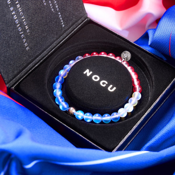 USA II Mermaid Glass Nations Bracelet with iridescent 6mm beads in red, white, and blue and silver charm in black gift box by NOGU